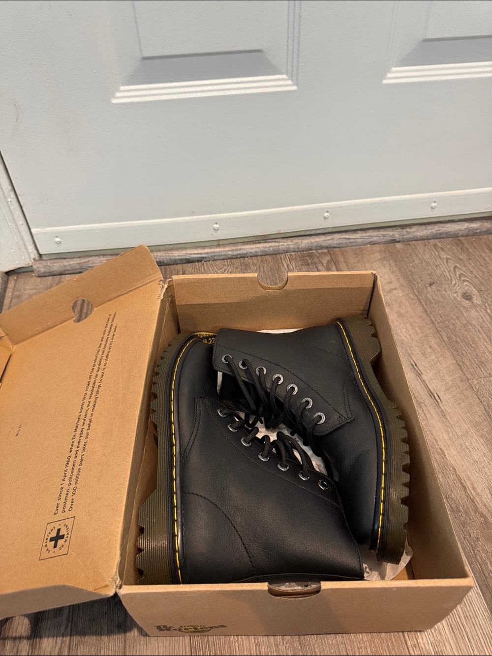 Dr. Martens Black Leather Lace-Up Combat Boots with Yellow Stitching